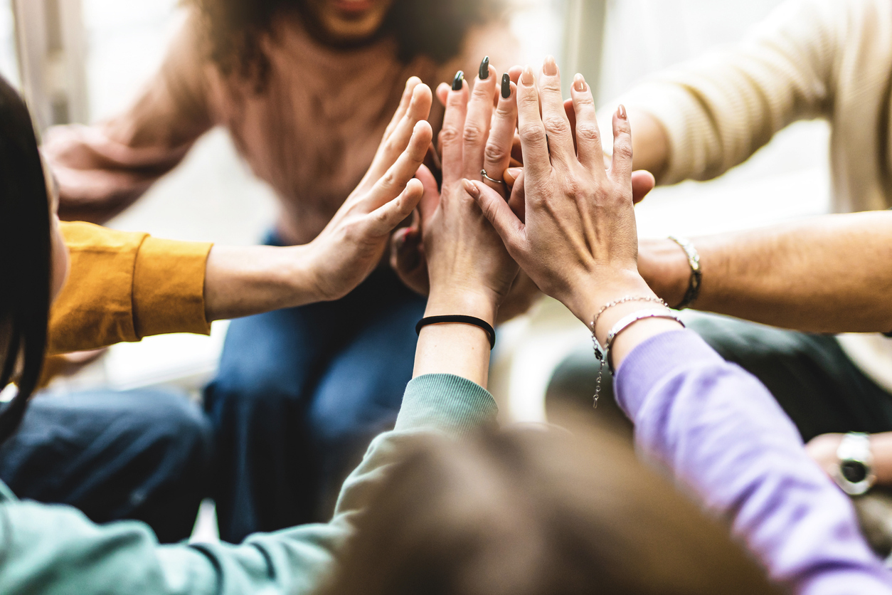Hands coming together during event contraction negotiation